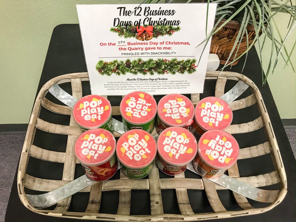 basket filled with mini cans of Pringles chips