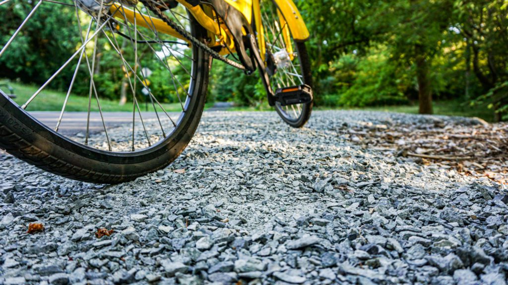 bike wheel with gravel underneath