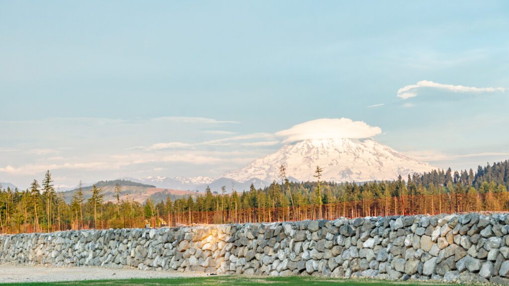 rock wall with Mt. Rainier in background