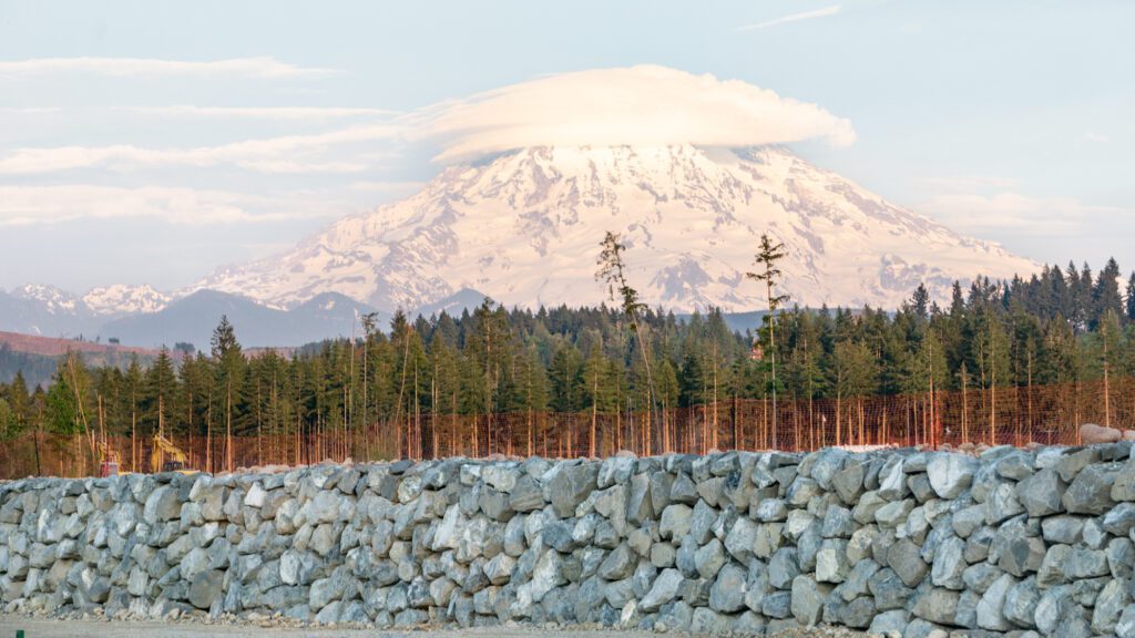 rock wall with Mt. Rainier in background